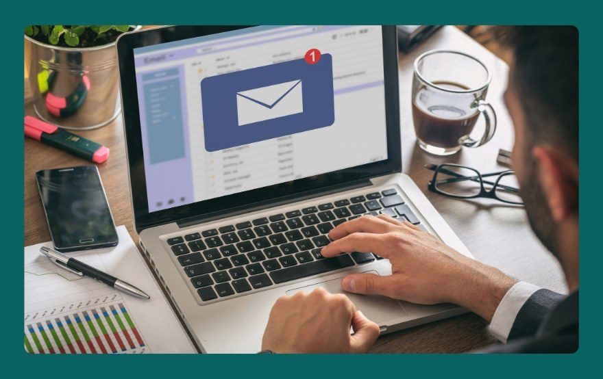 Creative entrepreneur at a desk reviewing an unread email notification on a laptop — reflecting on a missed business coaching opportunity